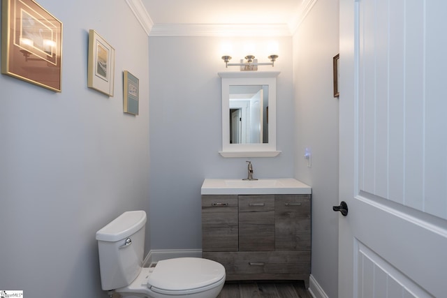 1122 Midway Rd, Pickens, SC 29671 - half bathroom featuring toilet, vanity, ornamental molding, wood finished floors, and baseboards