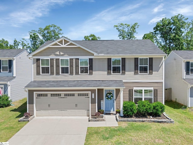 212 Ralston Dr, Greer, SC 29651 - view of front of home featuring an attached garage, driveway, and a front yard