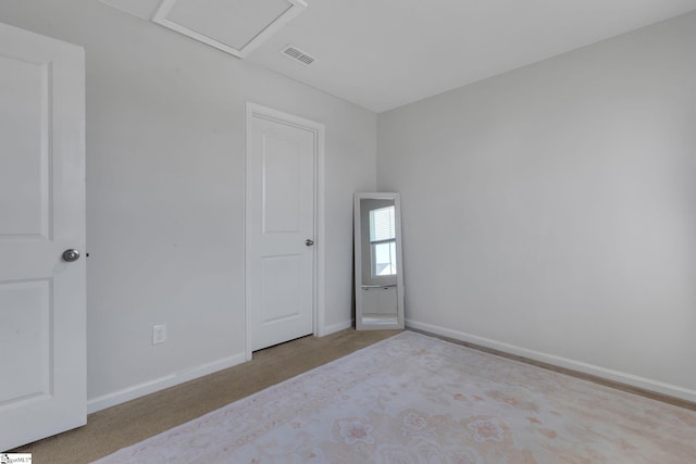 212 Ralston Dr, Greer, SC 29651 - unfurnished bedroom with attic access, carpet, and baseboards