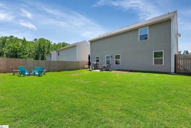 212 Ralston Dr, Greer, SC 29651 - back of property featuring a fire pit and a patio