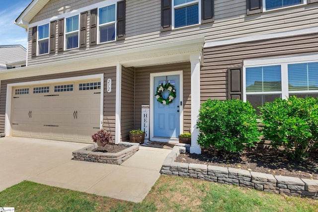 212 Ralston Dr, Greer, SC 29651 - property entrance featuring a garage and driveway
