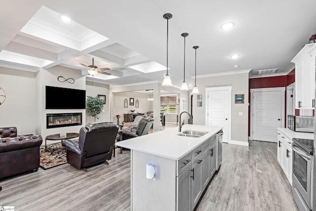 222 Blease Horton Rd, Boiling Springs, SC 29316 - kitchen with a sink, open floor plan, stainless steel appliances, light wood-style flooring, and beamed ceiling