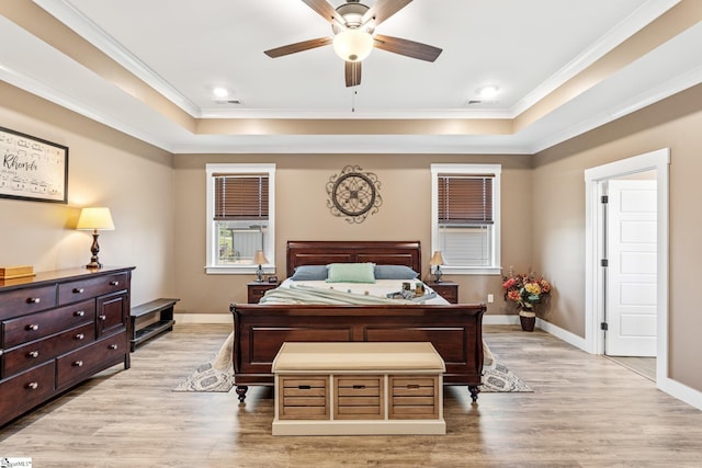 222 Blease Horton Rd, Boiling Springs, SC 29316 - bedroom featuring a raised ceiling, ornamental molding, light wood-type flooring, baseboards, and ceiling fan