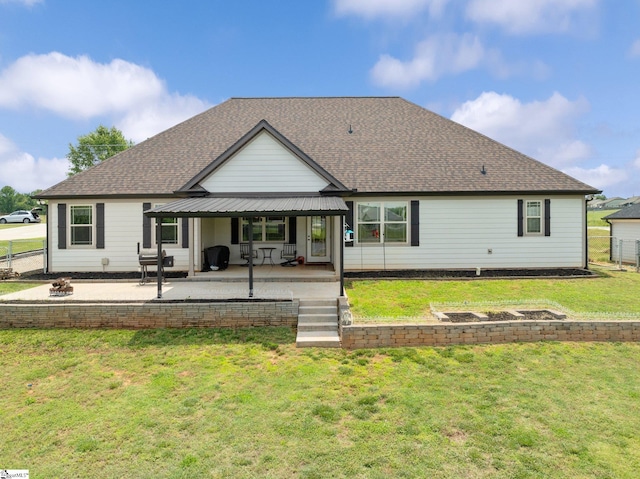 222 Blease Horton Rd, Boiling Springs, SC 29316 - back of property featuring roof with shingles, an outdoor fire pit, and a patio area