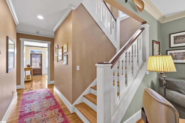509B Townes St, Greenville, SC 29601 - stairway with ornamental molding, wood finished floors, baseboards, and recessed lighting