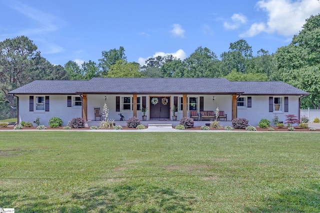 203 Rock Springs Rd, Belton, SC 29627 - single story home featuring a porch, a front yard, and stucco siding