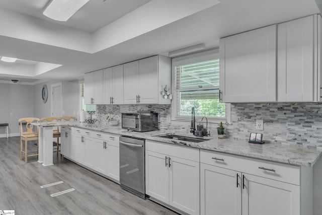 203 Rock Springs Rd, Belton, SC 29627 - kitchen with a tray ceiling, stainless steel appliances, white cabinets, and a sink