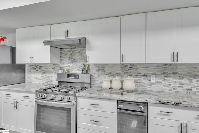 203 Rock Springs Rd, Belton, SC 29627 - kitchen featuring gas range, under cabinet range hood, white cabinetry, decorative backsplash, and light stone counters