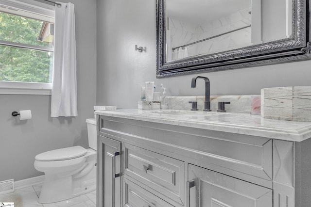 203 Rock Springs Rd, Belton, SC 29627 - full bathroom with toilet, vanity, baseboards, a shower with shower curtain, and marble look tile flooring