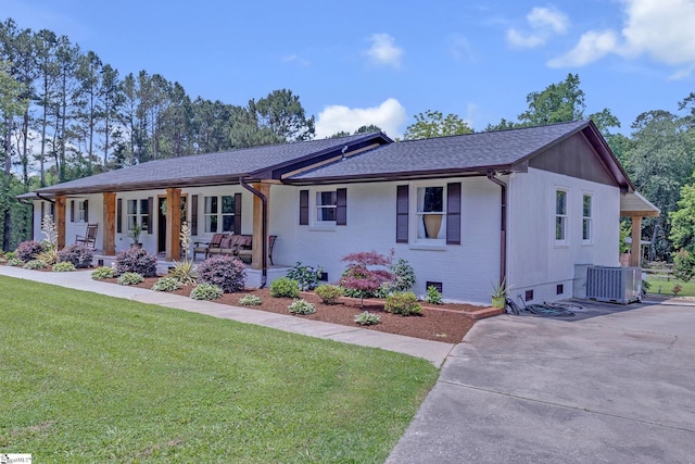 203 Rock Springs Rd, Belton, SC 29627 - ranch-style house with a porch, central air condition unit, crawl space, a front lawn, and brick siding