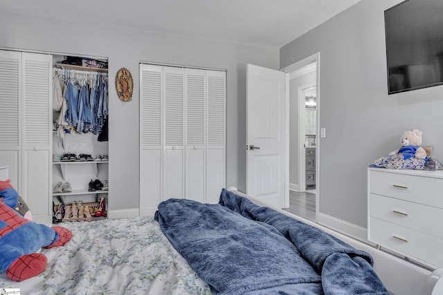 203 Rock Springs Rd, Belton, SC 29627 - bedroom featuring multiple closets and baseboards