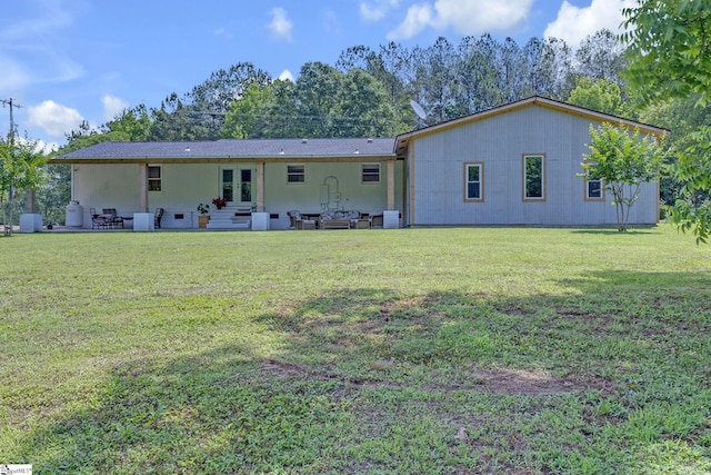 203 Rock Springs Rd, Belton, SC 29627 - back of property with french doors, a yard, and a patio area