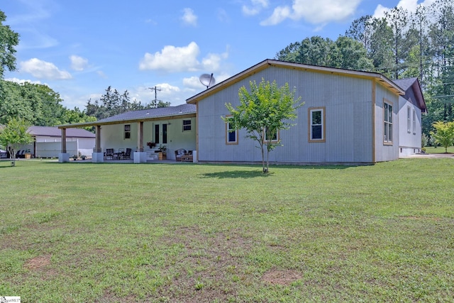 203 Rock Springs Rd, Belton, SC 29627 - back of house with a yard and a patio