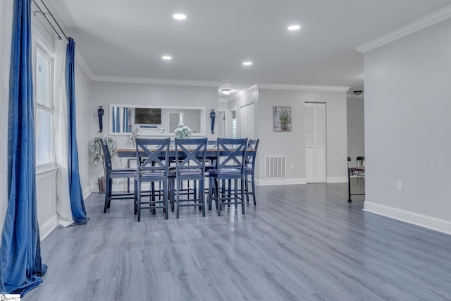 203 Rock Springs Rd, Belton, SC 29627 - dining area featuring baseboards, wood finished floors, ornamental molding, recessed lighting, and plenty of natural light
