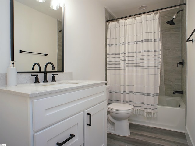 310 Sloping Meadow Dr, Inman, SC 29349 - full bathroom with vanity, toilet, wood finished floors, and shower / bathtub combination with curtain