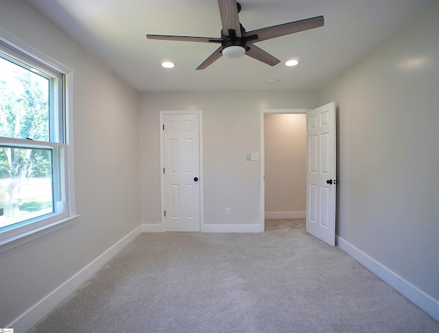 310 Sloping Meadow Dr, Inman, SC 29349 - unfurnished bedroom with recessed lighting, light carpet, baseboards, and a ceiling fan