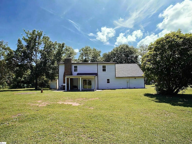 310 Sloping Meadow Dr, Inman, SC 29349 - back of house with a yard and a chimney
