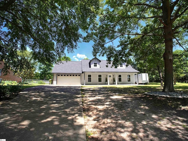 310 Sloping Meadow Dr, Inman, SC 29349 - view of front of home with driveway, an attached garage, and a shingled roof