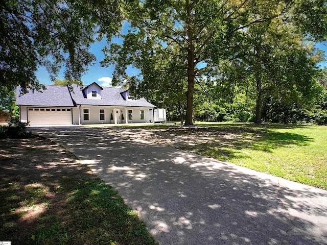 310 Sloping Meadow Dr, Inman, SC 29349 - view of front of home with driveway, an attached garage, a front lawn, and roof with shingles