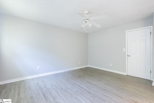 112 Summer Dr, Easley, SC 29642 - unfurnished room with wood finished floors, a ceiling fan, and baseboards