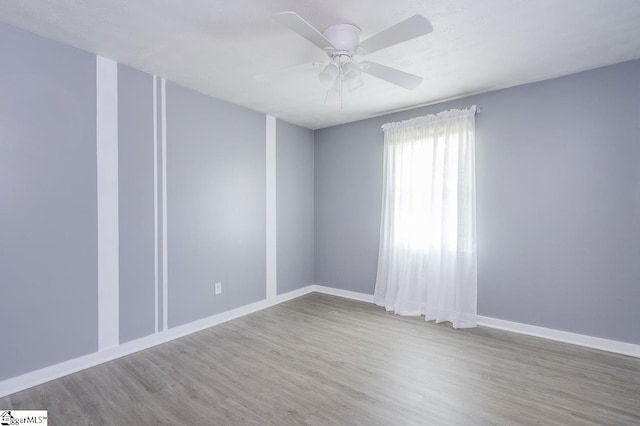 112 Summer Dr, Easley, SC 29642 - unfurnished room featuring a ceiling fan, wood finished floors, and baseboards