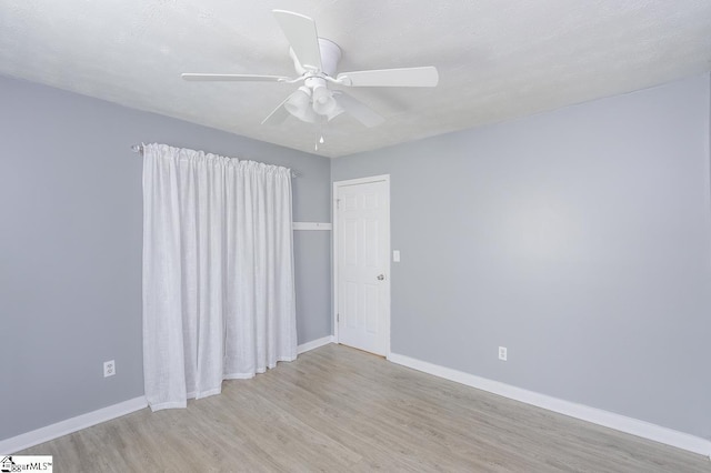 112 Summer Dr, Easley, SC 29642 - unfurnished room with wood finished floors, baseboards, and ceiling fan