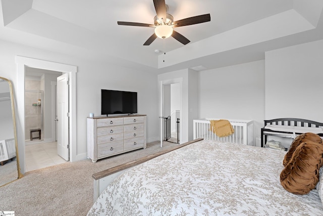 101 Hazelcroft Dr, Fountain Inn, SC 29644 - carpeted bedroom with a raised ceiling, baseboards, and a ceiling fan