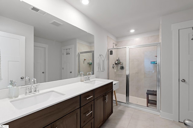 101 Hazelcroft Dr, Fountain Inn, SC 29644 - full bathroom featuring a shower stall, double vanity, tile patterned floors, recessed lighting, and baseboards