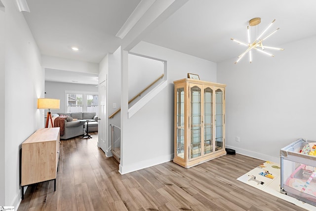 101 Hazelcroft Dr, Fountain Inn, SC 29644 - playroom with wood finished floors, recessed lighting, baseboards, and a chandelier