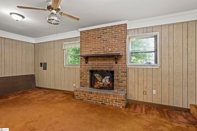 303 Suber Rd, Greer, SC 29651 - unfurnished living room featuring baseboards, healthy amount of natural light, carpet floors, a brick fireplace, and wood walls
