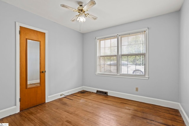 303 Suber Rd, Greer, SC 29651 - empty room with plenty of natural light, baseboards, and wood finished floors