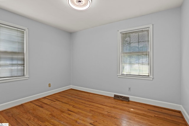 303 Suber Rd, Greer, SC 29651 - empty room with baseboards and wood finished floors