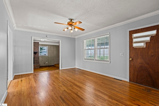 303 Suber Rd, Greer, SC 29651 - foyer with a textured ceiling, ceiling fan, wood finished floors, crown molding, and baseboards