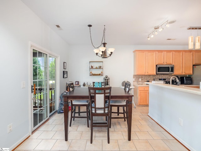 6 Baneberry Ct, Simpsonville, SC 29680 - dining area with a chandelier and light tile patterned floors