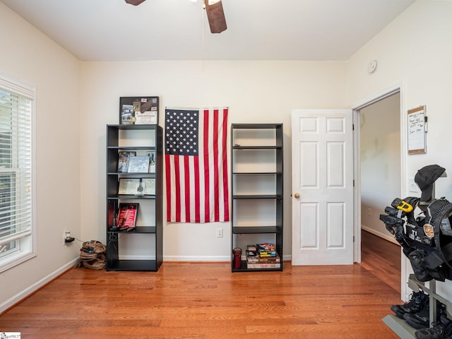 6 Baneberry Ct, Simpsonville, SC 29680 - home office with wood finished floors, a ceiling fan, and baseboards