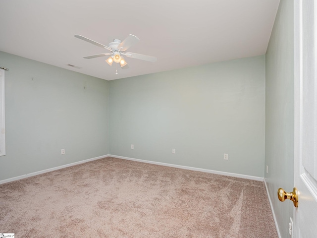 6 Baneberry Ct, Simpsonville, SC 29680 - spare room featuring carpet flooring, a ceiling fan, and baseboards