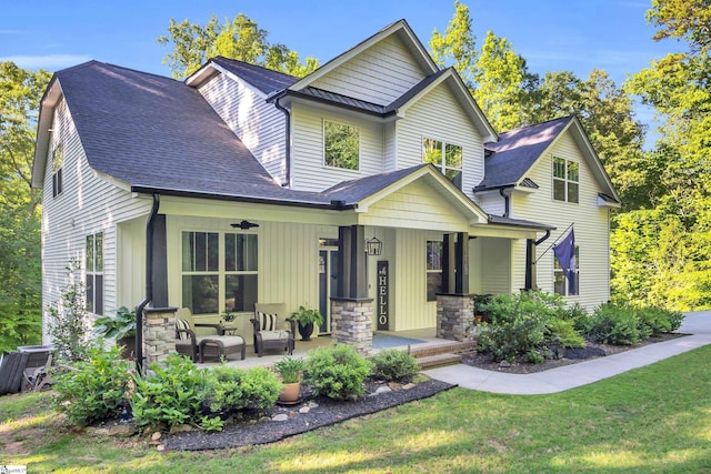 118 Perry Hill Rd, Easley, SC 29640 - craftsman inspired home with a porch, board and batten siding, a front yard, and stone siding