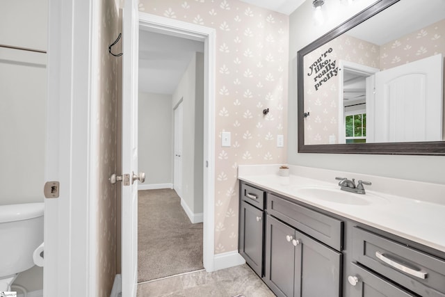 118 Perry Hill Rd, Easley, SC 29640 - bathroom featuring wallpapered walls, vanity, toilet, and baseboards