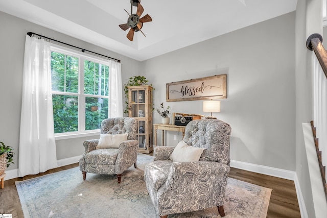 118 Perry Hill Rd, Easley, SC 29640 - sitting room with baseboards, wood finished floors, ceiling fan, and a raised ceiling