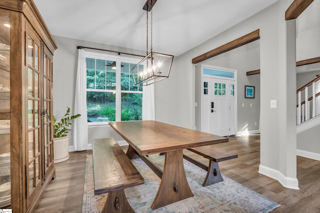 118 Perry Hill Rd, Easley, SC 29640 - dining room with wood finished floors, baseboards, a chandelier, and stairs