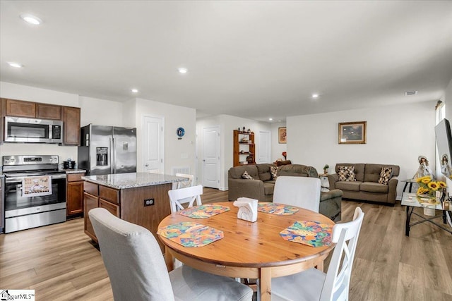 104 Timothy Pl, Easley, SC 29642 - dining space with light wood-style floors and recessed lighting