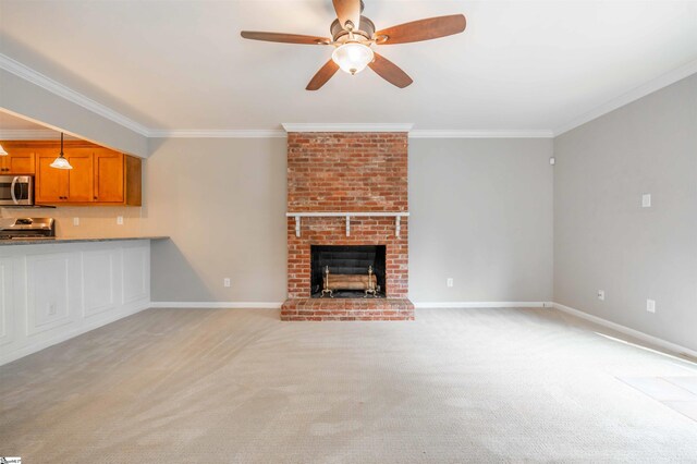 236 S Park Dr, Spartanburg, SC 29302 - unfurnished living room featuring ornamental molding, ceiling fan, light carpet, a brick fireplace, and baseboards
