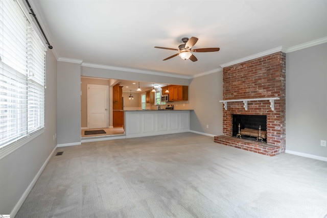 236 S Park Dr, Spartanburg, SC 29302 - unfurnished living room featuring ceiling fan, light carpet, crown molding, baseboards, and a brick fireplace