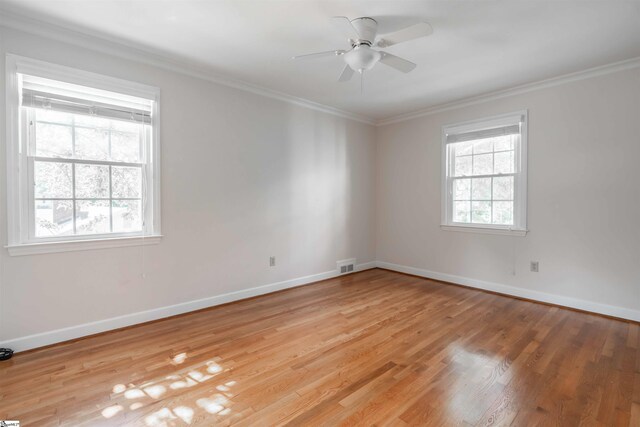 236 S Park Dr, Spartanburg, SC 29302 - spare room with light wood-style flooring, baseboards, ornamental molding, and a ceiling fan