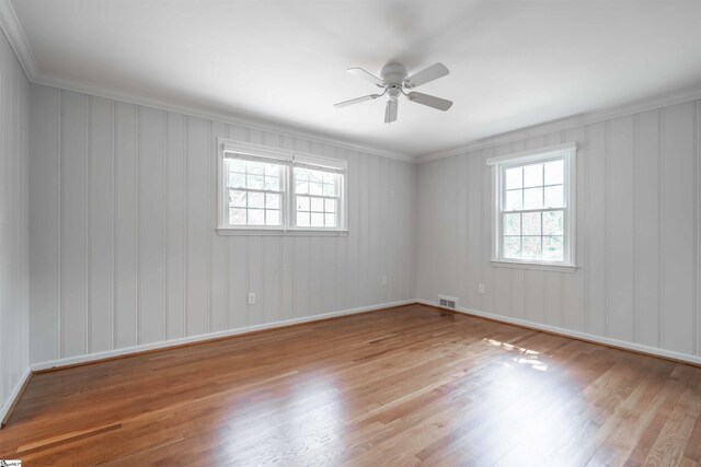 236 S Park Dr, Spartanburg, SC 29302 - spare room featuring healthy amount of natural light, wood finished floors, ornamental molding, and ceiling fan