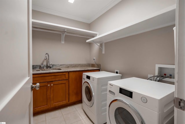 236 S Park Dr, Spartanburg, SC 29302 - laundry area featuring cabinet space, crown molding, washer and clothes dryer, and light tile patterned flooring