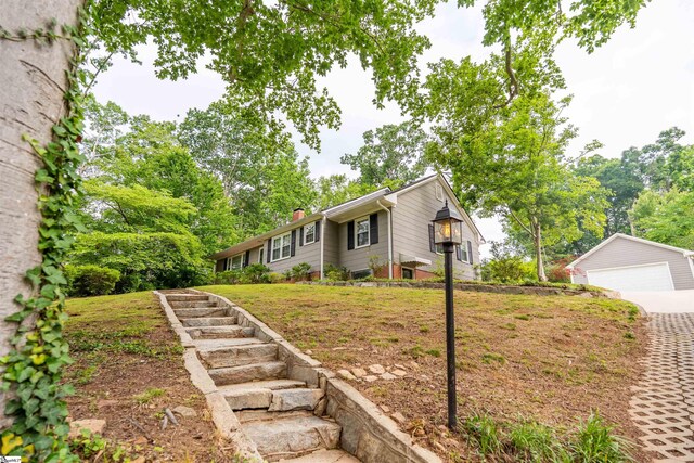 236 S Park Dr, Spartanburg, SC 29302 - view of front of property featuring a chimney, an outbuilding, and a detached garage