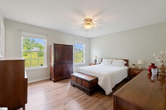 410 Garden Gate Ct, Duncan, SC 29334 - bedroom featuring light wood-type flooring, baseboards, and ceiling fan