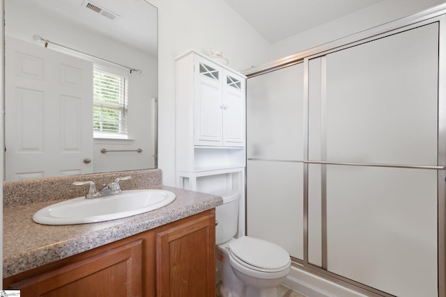 410 Garden Gate Ct, Duncan, SC 29334 - bathroom featuring a stall shower, vanity, and toilet