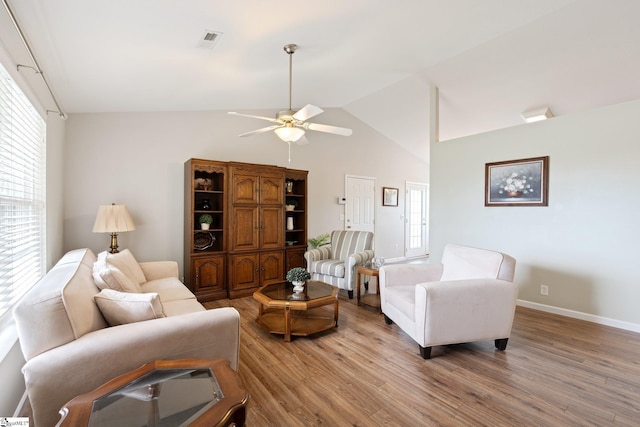 410 Garden Gate Ct, Duncan, SC 29334 - living area featuring light wood-type flooring, a ceiling fan, baseboards, and high vaulted ceiling